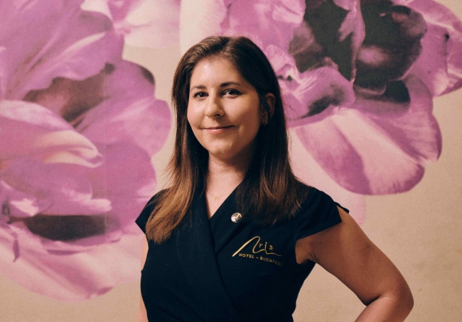 A lady relaxing in Harmony Spa's Indoor Pool.
